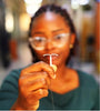 Image of a healthcare professional holding up an IUD